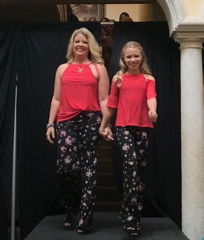 Michelle Gervais and her daughter modeling at the Fashion for Hope event. 