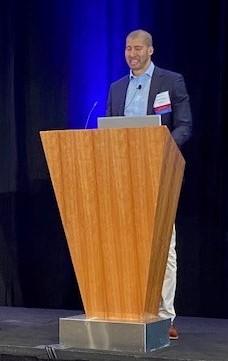 Bill Bennett speaks at podium at SEALI 2021 Summer Seminar (June 25 2021)