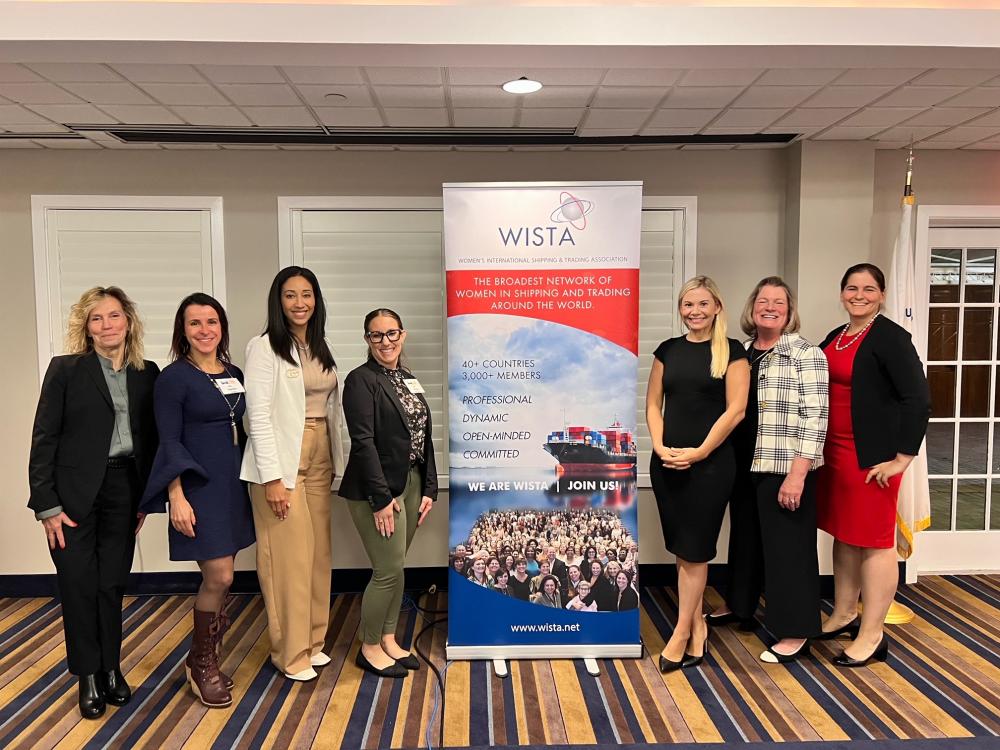 Holli Packer (far right) and Lauren Wilgus (third from right) at “Charting New Horizons: Women in Maritime—Uniting Generations and Inspiring Futures,” November 1, 2023.